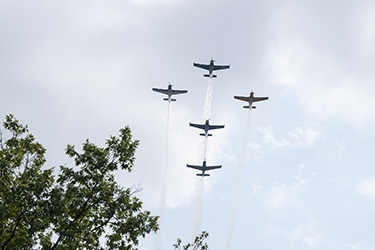 photo of airplanes flying over campus