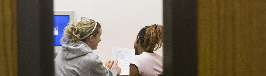 photo of two students studying