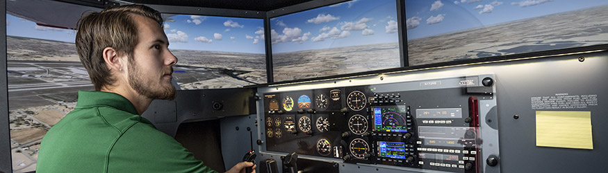 photo of an instructor in a flight simulator