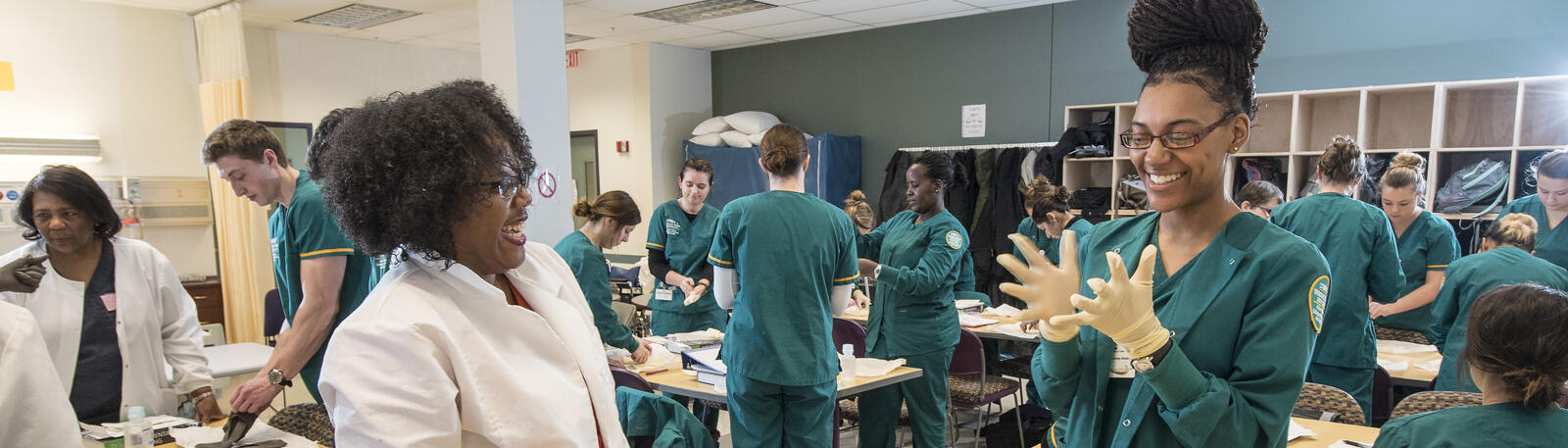 photo of a nursing student and instructor in a lab at wright state