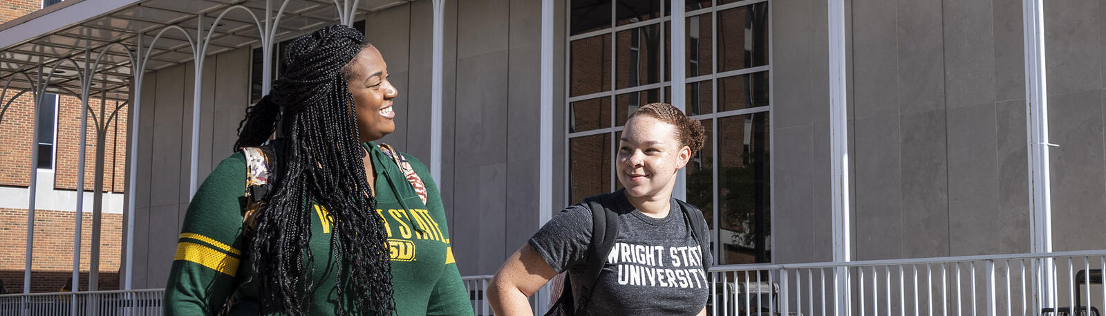 photo of two students walking outside on wright state's campus