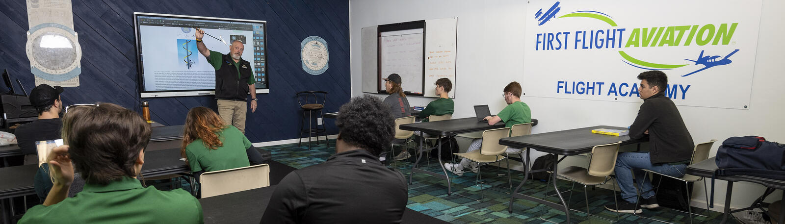 photo of students and an instructor in a classroom