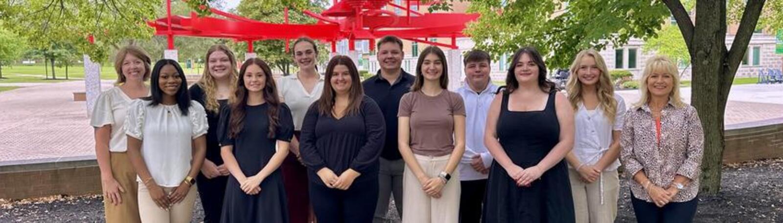 photo of students and the dean outside on wright state's campus