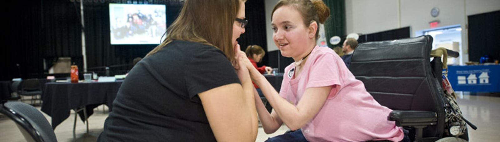 photo of students sitting together on campus