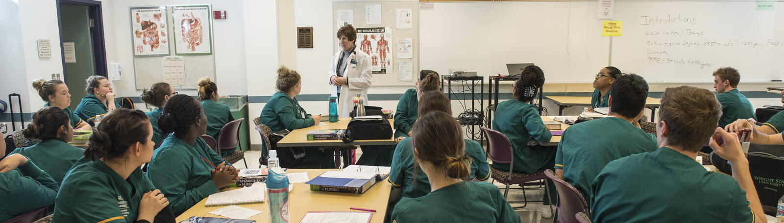 photo of nursing students and an instructor in a classroom