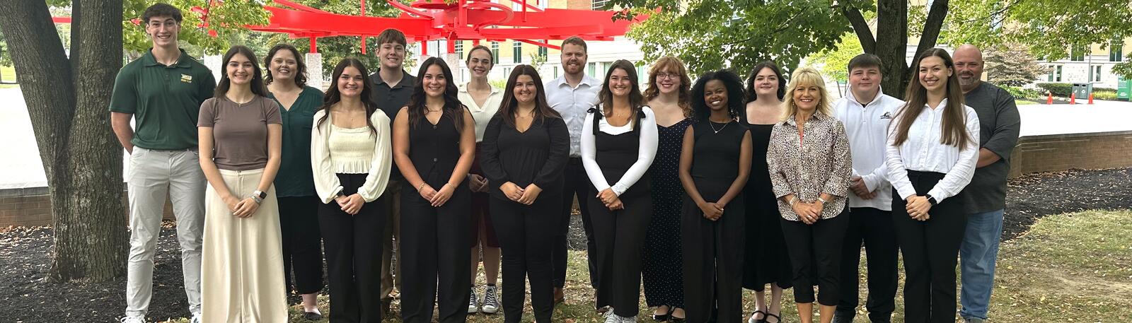 Photo of CHEH Dean's Student Advisory Board 2025-2026 standing in a staggered line.