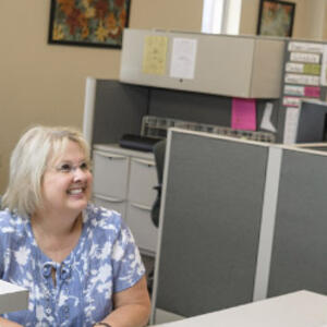 photo of a student and staff member